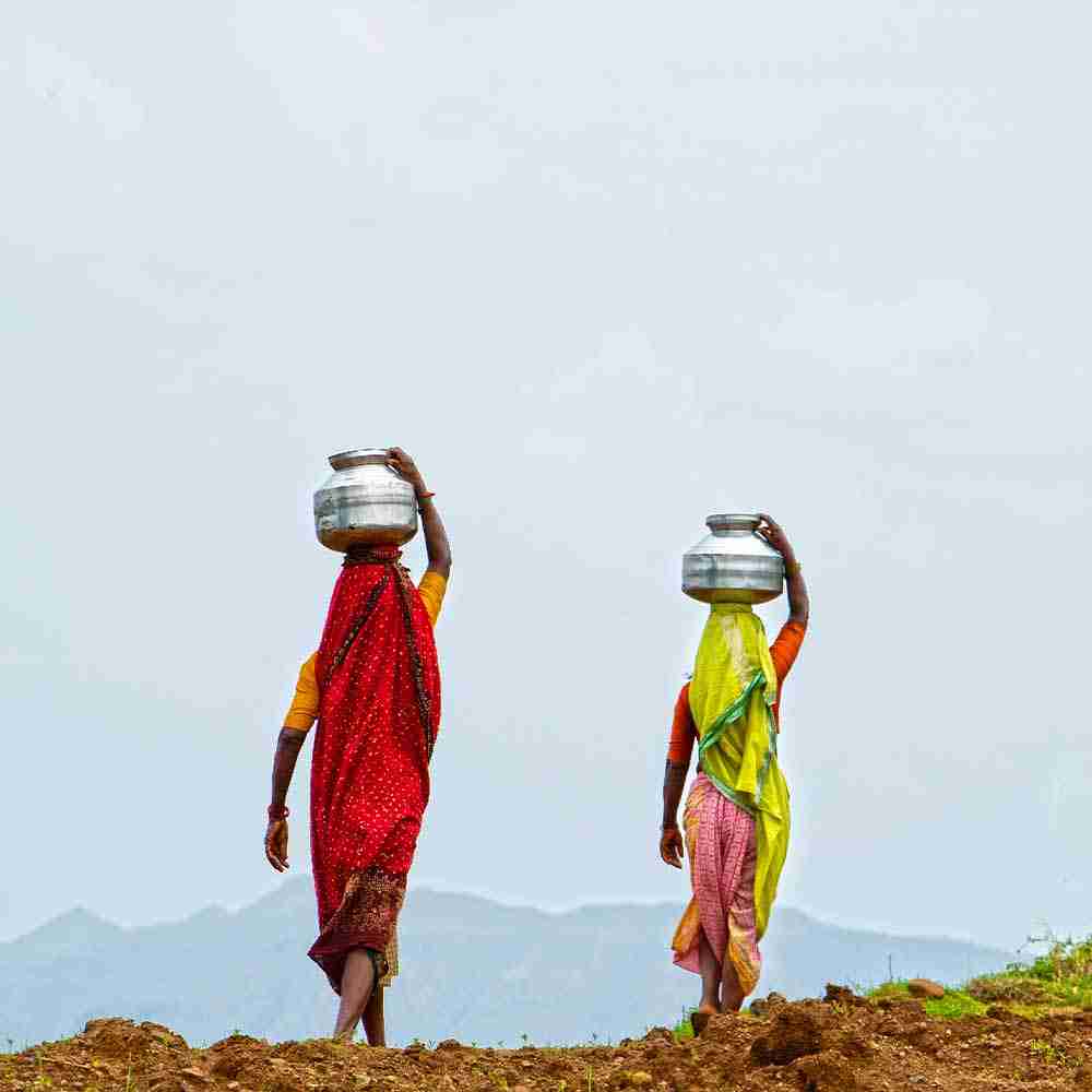 Women walk for hours to acquire water, which are often contaminated.