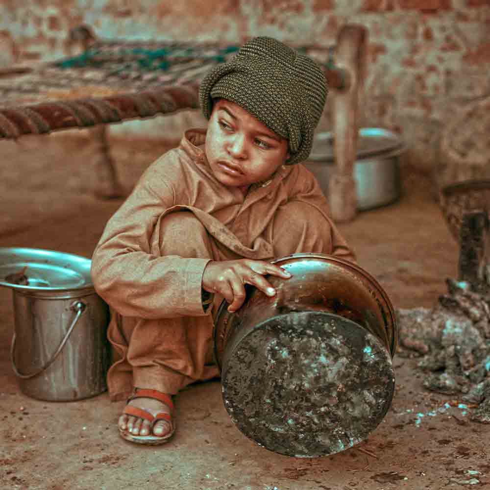 A young boy in Pakistan. One in three Pakistanis lives below the poverty line.
