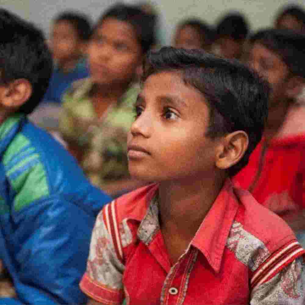 Bir, like the boy pictured, excelled in school through the care and tutoring at Bridge of Hope.