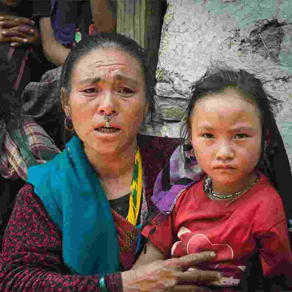 A widow and her child in the aftermath of earthquakes in Nepal