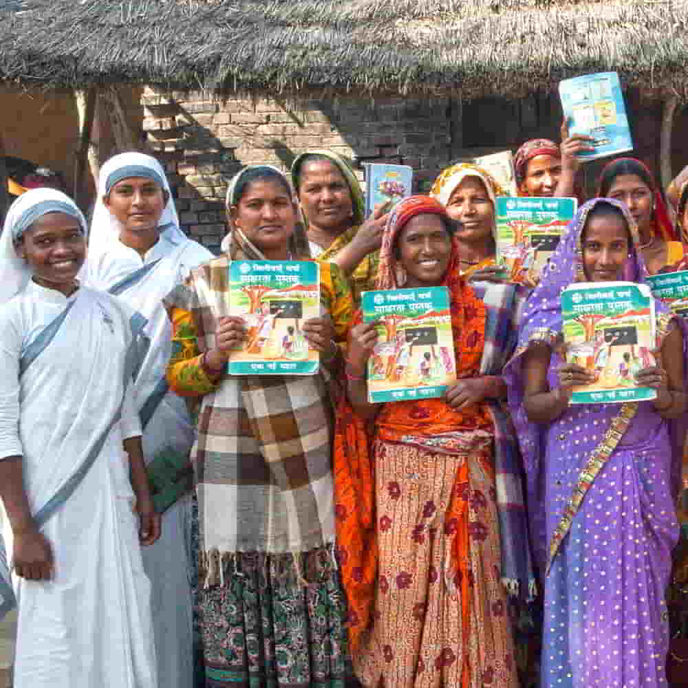 GFA World adult literacy class Women missionaries with their students