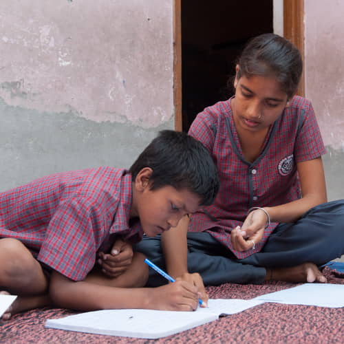 Children studying in GFA World child sponsorship class