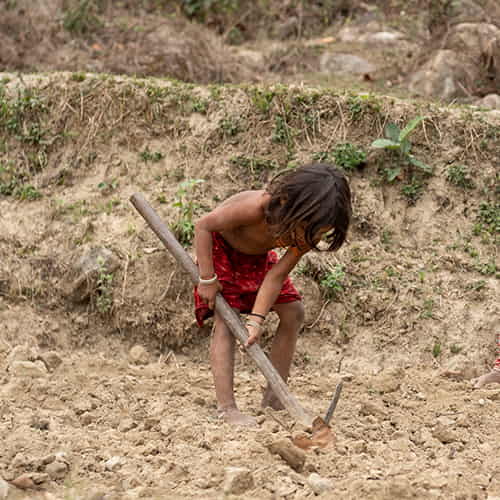 Young boy in child labor from South Asia