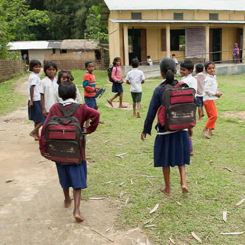 Children walking to GFA World child sponsorship program class
