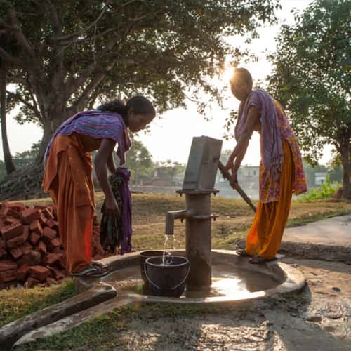 Women draw clean water from GFA World Jesus Wells