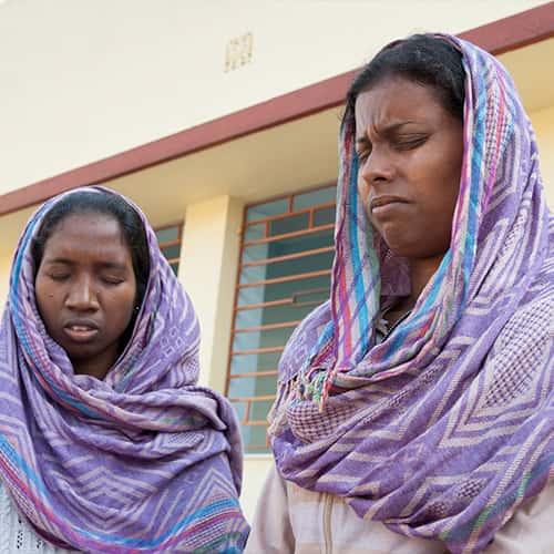 GFA World women missionaries praying