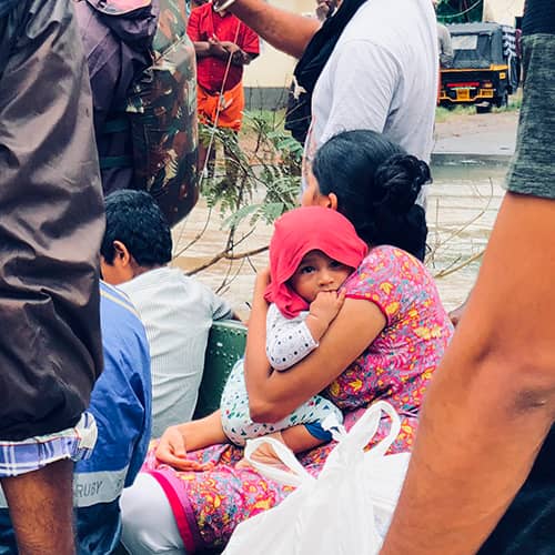 Woman and child rescued by GFA World disaster relief teams in the flooding disaster in South Asia in 2018
