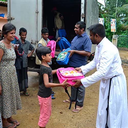 GFA World (Gospel for Asia) disaster relief volunteer supplies distribution in Sri Lanka