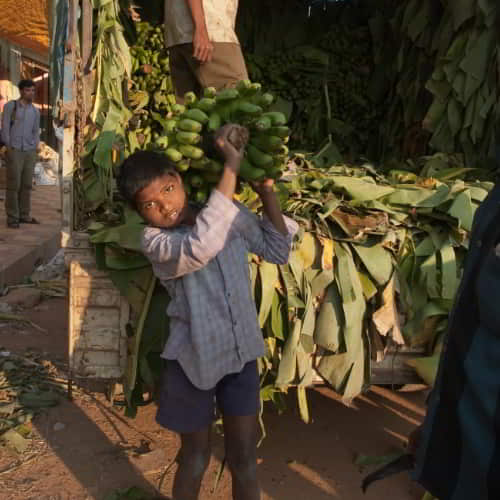 Young boy in child labor is not able to pursue an education due to the effects of poverty