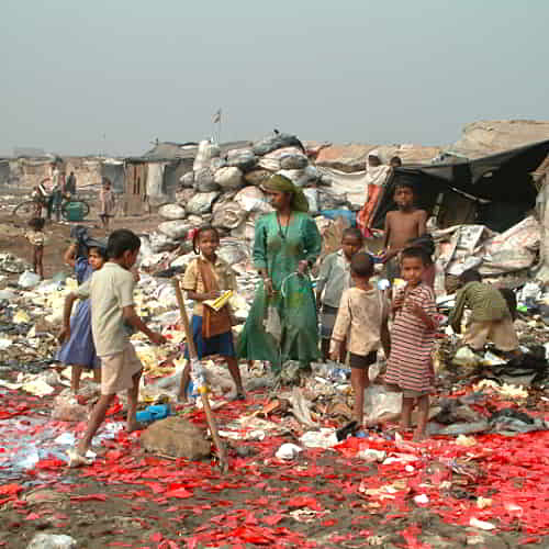 Woman and children living in the slums of South Asia trapped in the cycle of poverty