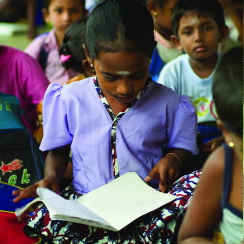 Young girl studying in GFA World Child Sponsorship Program