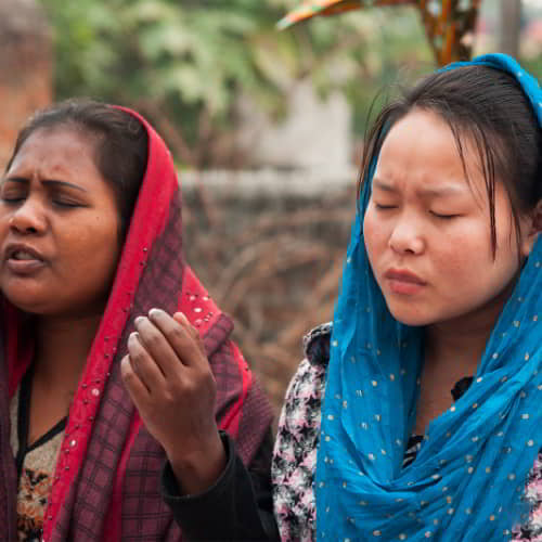 GFA World women missionaries praying