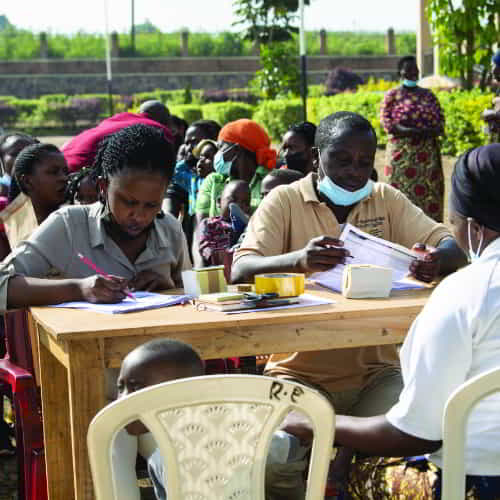 Rwanda community members receiving benefits from GFA Child Sponsorship Program