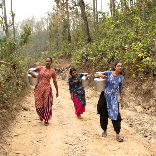 Women and children walk long distances to collect water