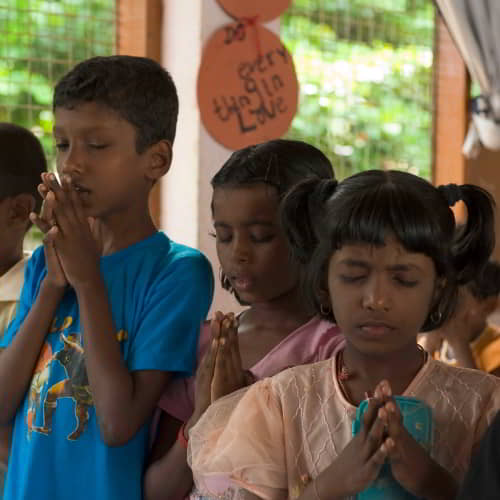 Children praying in GFA World child sponsorship program