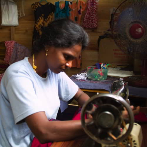 Woman blessed with a poverty alleviating sewing machine