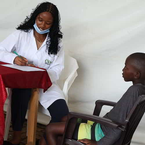 Child patient visits GFA World free medical camp in Rwanda Africa