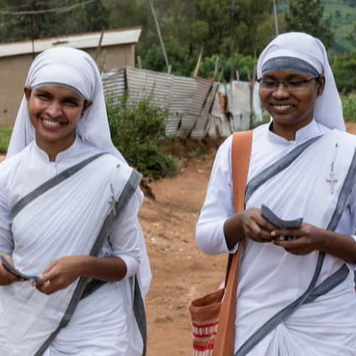 Sisters of the Cross wear a long white robe, a sari, which is a traditional uniform worn by the lowliest servants in Asia