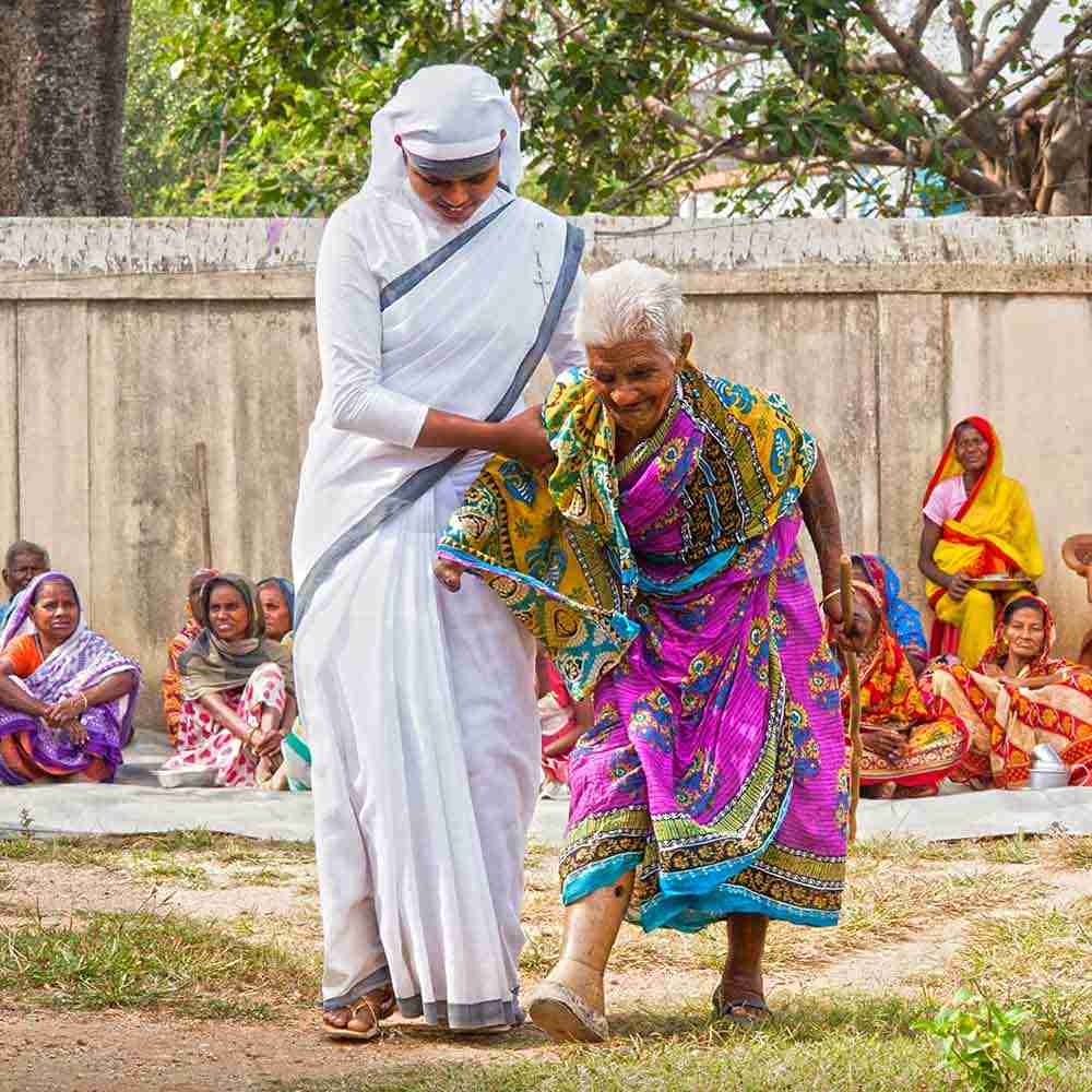 Sisters of Compassion helping a leprosy patient