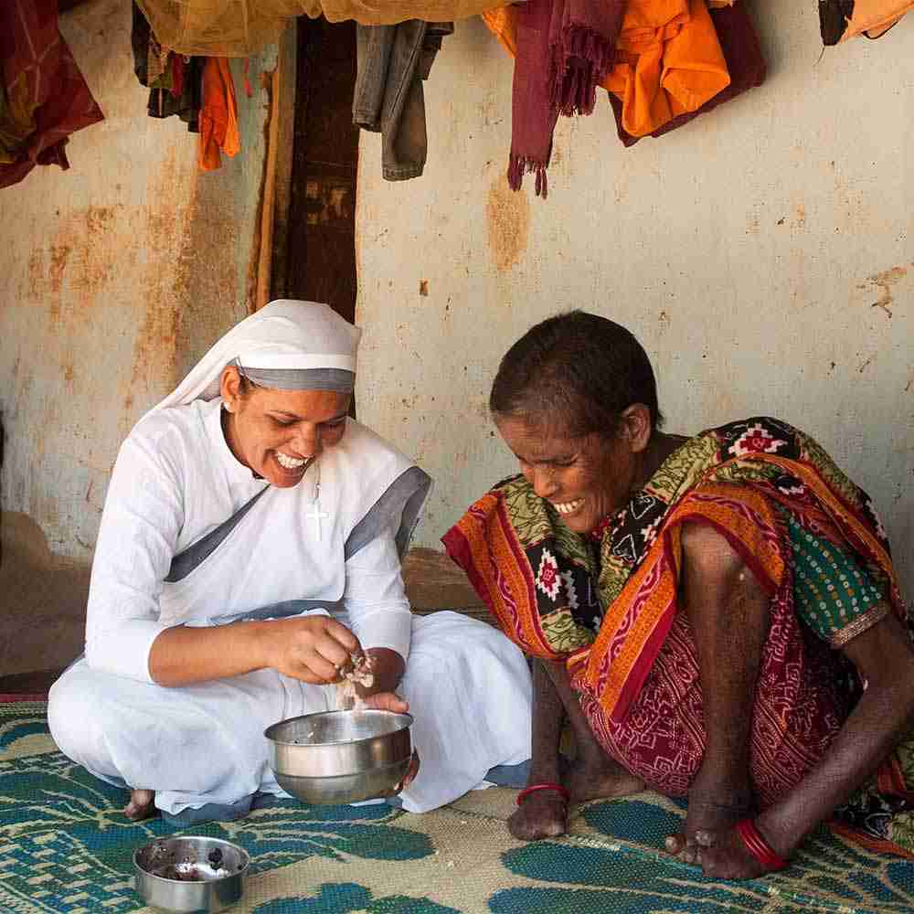 Sisters of Compassion prepares a meal for this leprosy patient