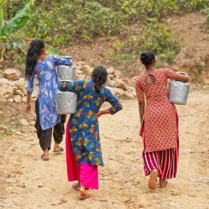 These women walk long distances every morning to carry back home heavy jars of water