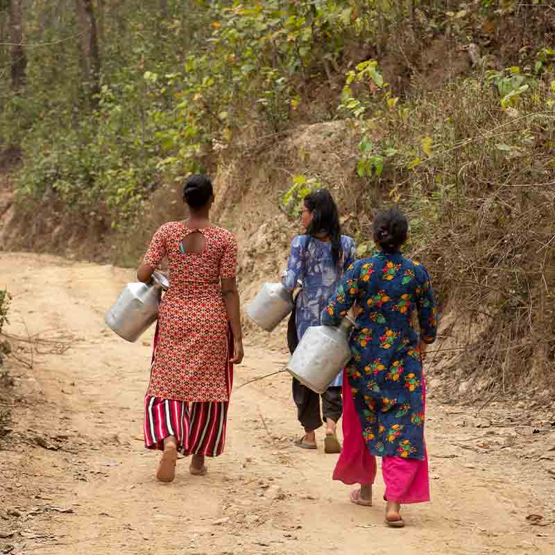Due to severe water stress these women walk long distances to acquire water