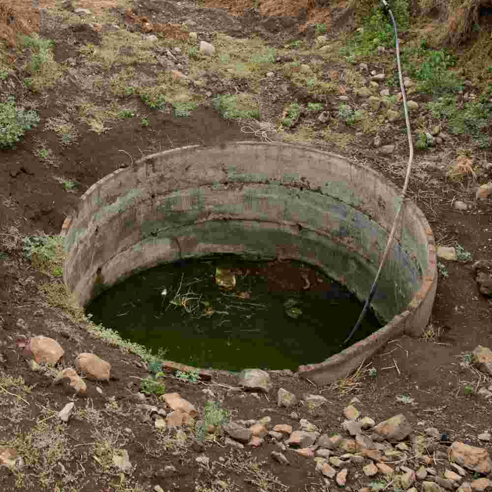 An open well full of contaminated water