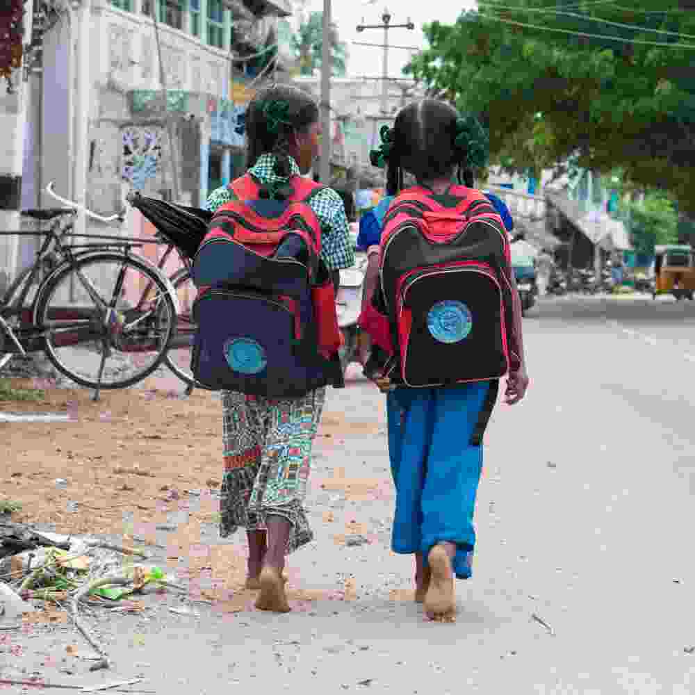 Girls walking to their class at GFA World child sponsorship program Bridge of Hope