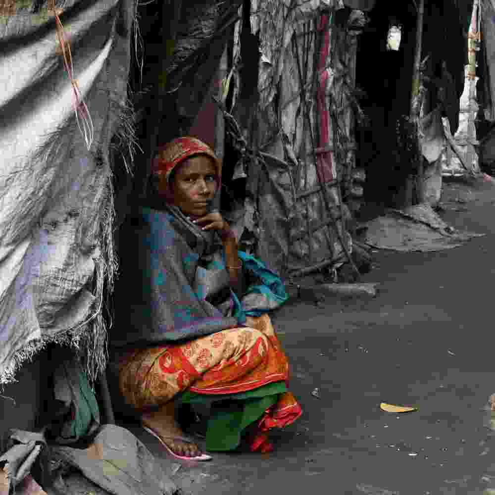 Woman in poverty living in the slums