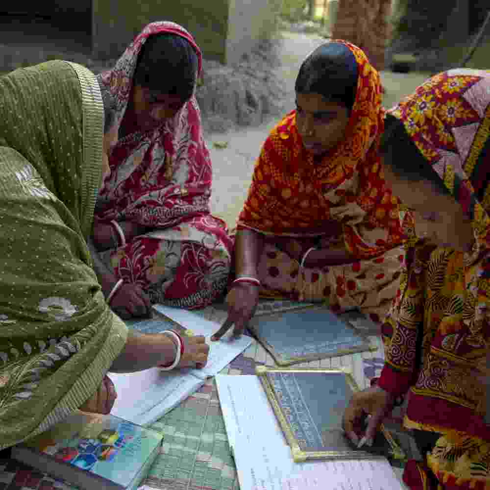 Group of women studying in adult literacy class