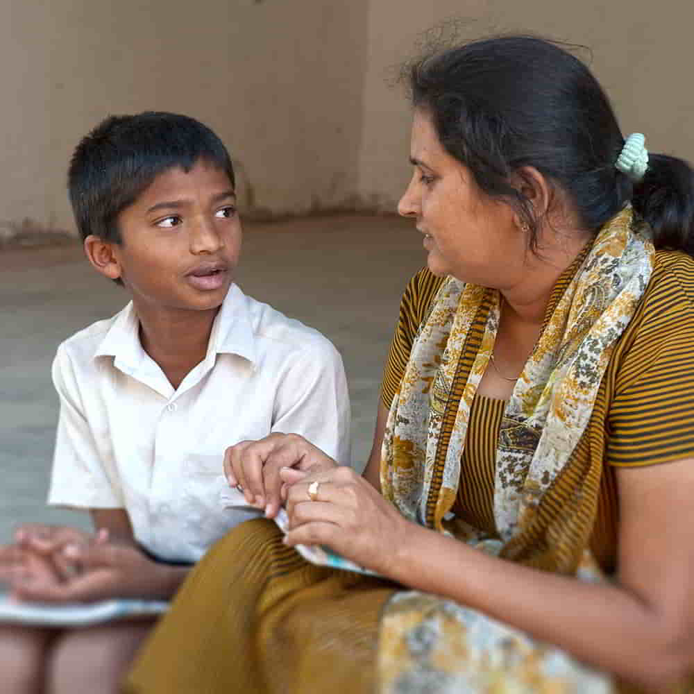Woman missionary teaching in GFA World child sponsorship Bridge of Hope