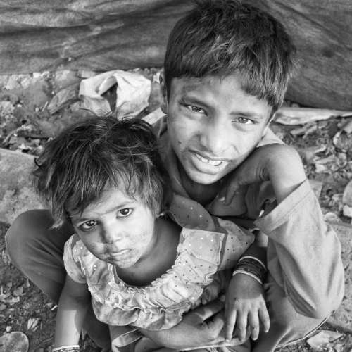 Siblings living in the slums in poverty