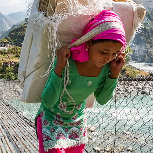GIrl in child labor in Nepal