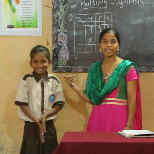 GFA World child sponsorship girl student with teacher