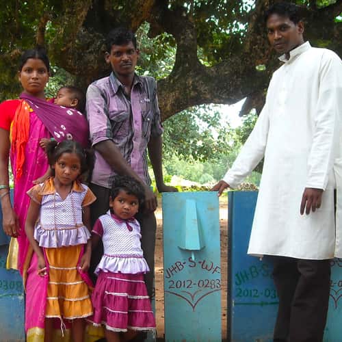 Aajay and his family enjoys clean water through GFA World BioSand water filters