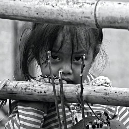 Young girl in Laos in poverty