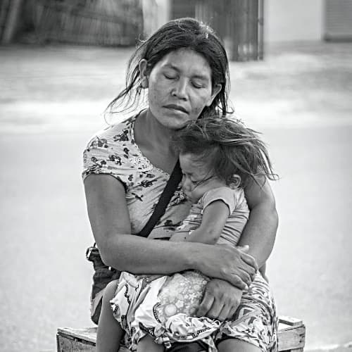 Mother and child in poverty in South America