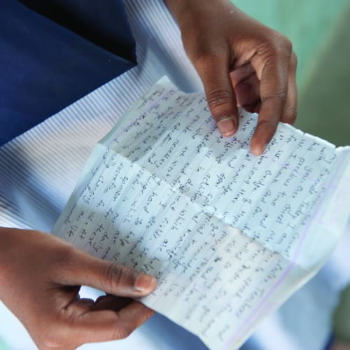 Letters between the sponsor and sponsored child serve as a testament to the power of relationship, reminding children that they are loved, remembered, and important